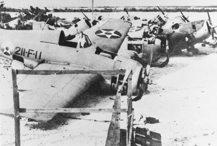 Wrecked Grumman F4F-3 Wildcats in the sand