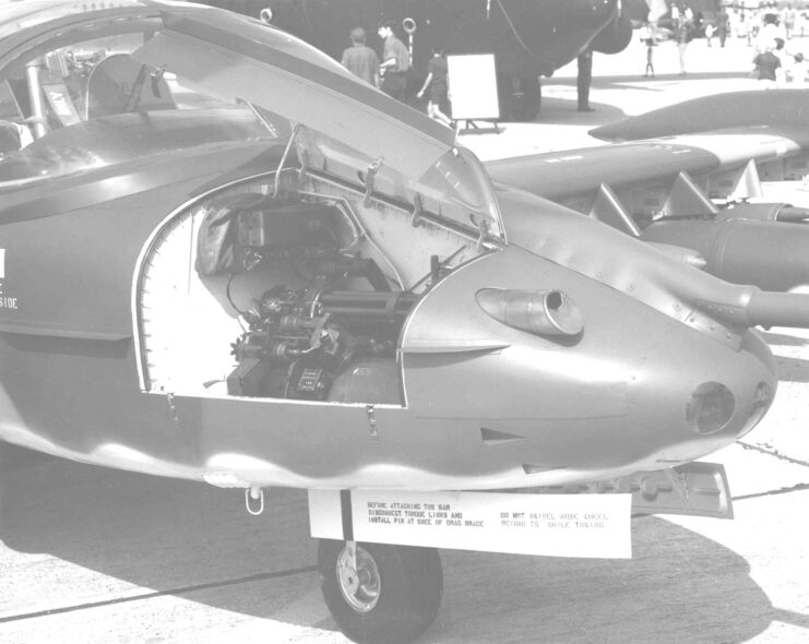 Minigun compartment in the right nose of a Cessna D-37B Dragonfly