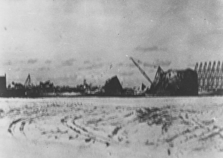 Destroyed fuel storage tanks in the sand