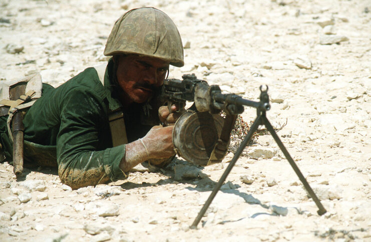 Egyptian Marine aiming an RPD machine gun