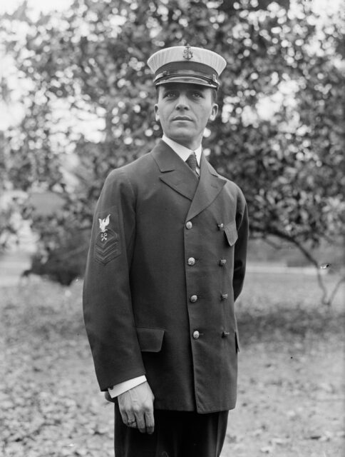CPO. Y.B. Minzo standing outside in his US Navy uniform