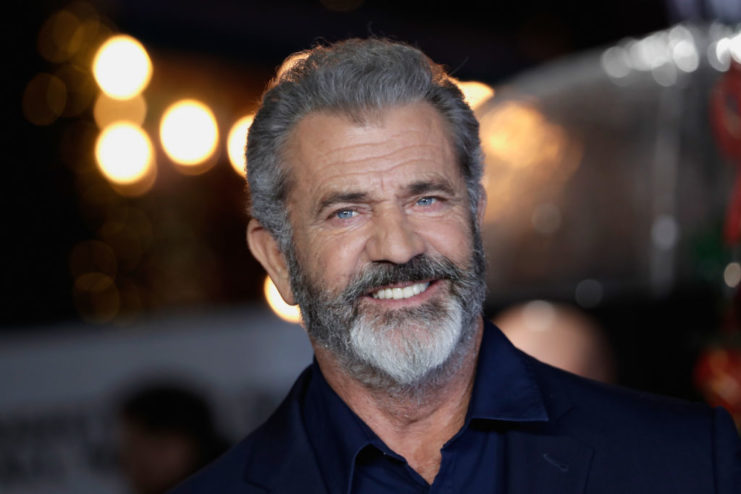 Mel Gibson posing on a red carpet