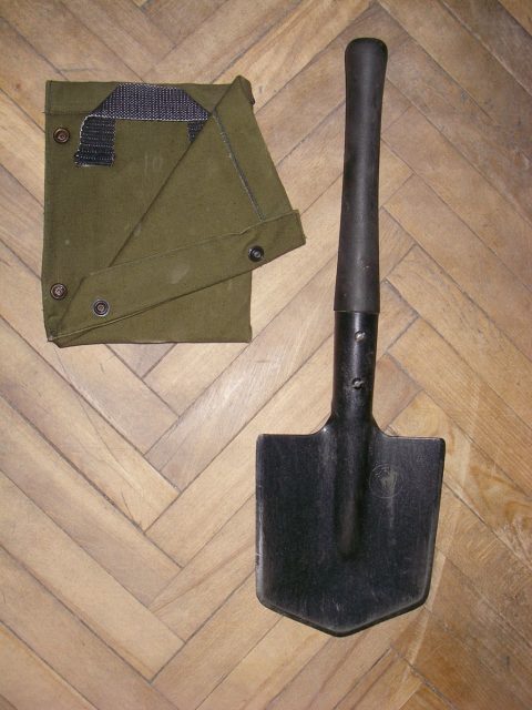 MPL-50 and its cover laid on a wooden floor