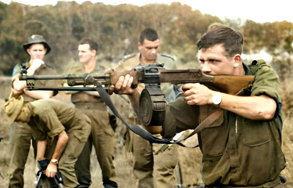 Australian soldier firing an RPD Machine Gun