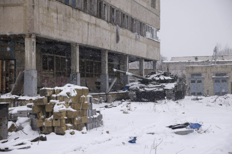 Destroyed tank abandoned in the snow