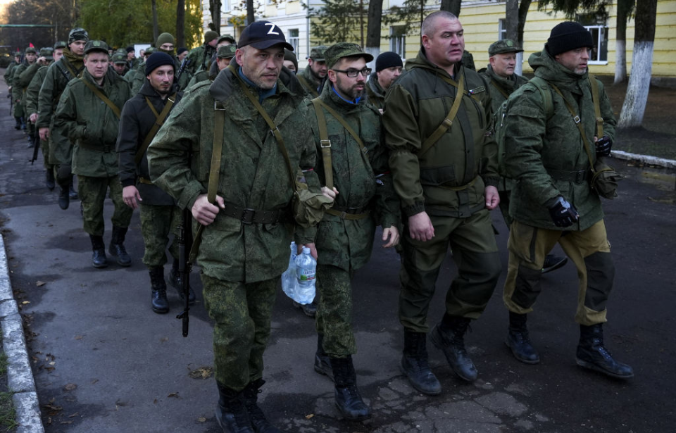 Russian conscripts walking together in uniform