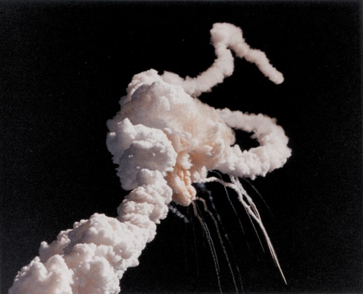 Space Shuttle Challenger shrouded in smoke
