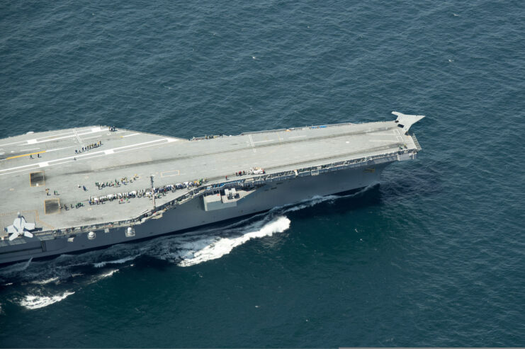 Aerial view of a Northrop Grumman X-47B taking off from the flight deck of the USS George H.W. Bush (CVN-77)