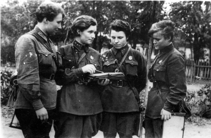 Four members of the Night Witches standing together outside