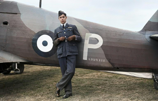 Edgar "Cobber" Cain leaning against a Hawker Hurricane Mk I