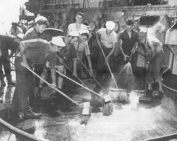 Sailors scrubbing the deck of Prinz Eugen