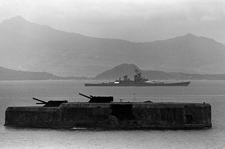 USS New Jersey (BB-62) sailing by Fort Drum