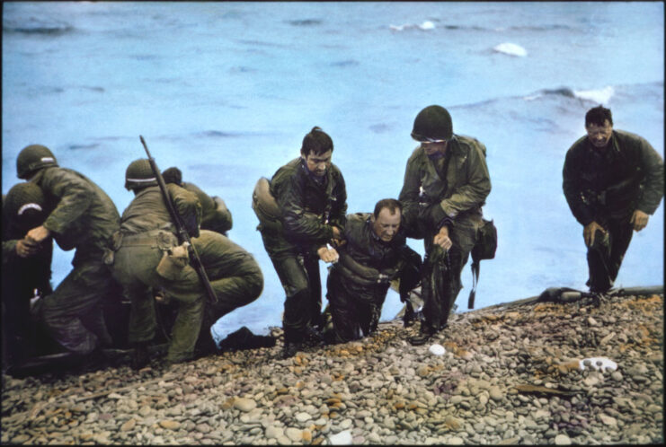 Nicholas Russin and members of the 116th Infantry Regiment, 29th Infantry Division arriving on a beach