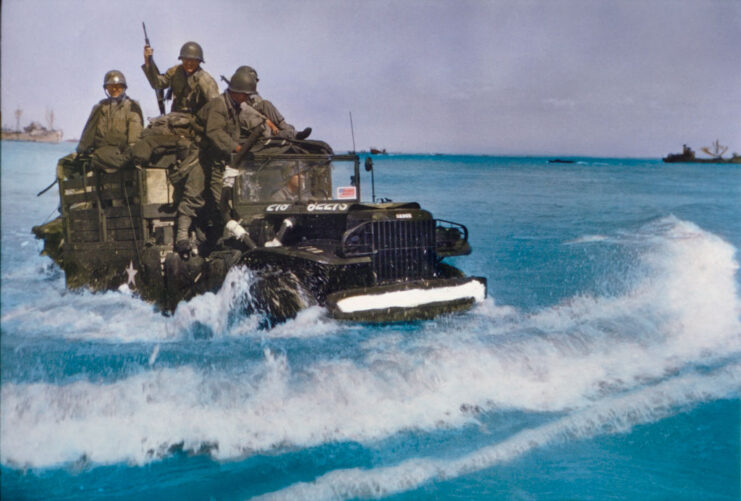 American soldiers driving a Jeep through the water