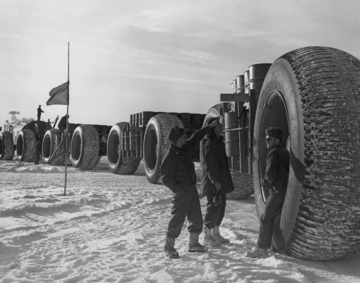 US military personnel standing beside a LeTourneau LCC-1 Sno-Train