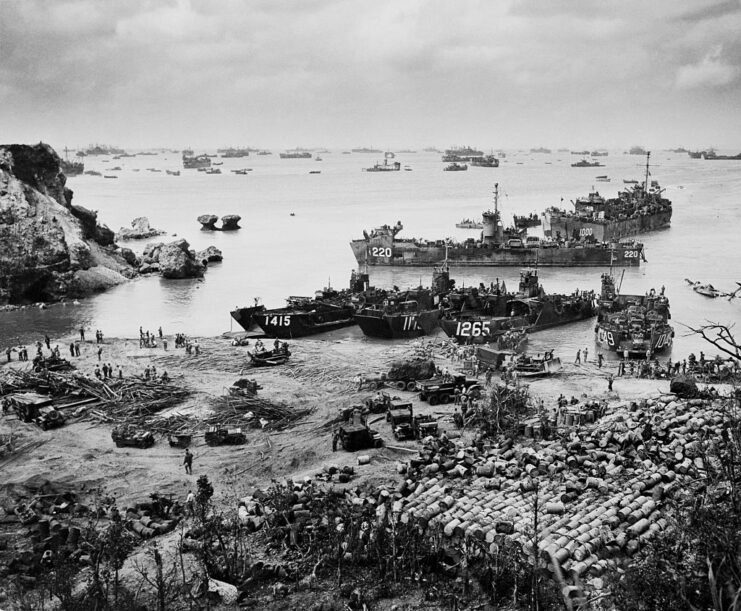 Ships, equipment and military personnel gathered around the shore of Okinawa