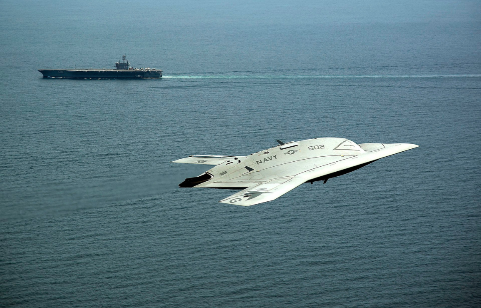 Northrop Grumman X-47B flying near the USS George H.W. Bush (CVN-77)