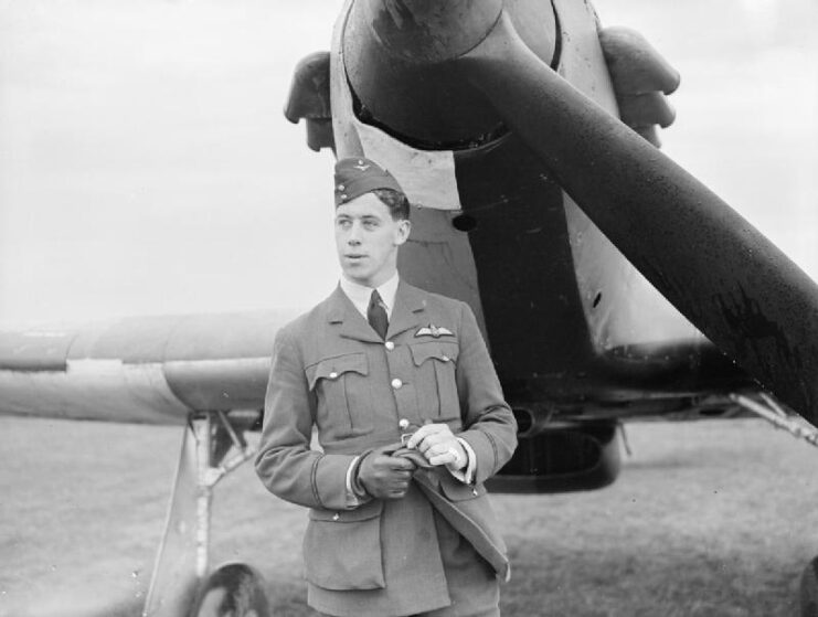 Edgar "Cobber" Kain standing in front of his Hawker Hurricane Mk I