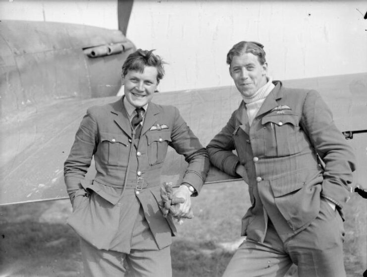 Newell Orton and Edgar "Cobber" Kain leaning against the wing of a Hawker Hurricane Mk I