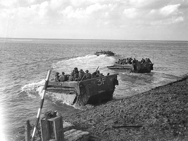 Troops with the Canadian First Army coming ashore in amphibious vehicles