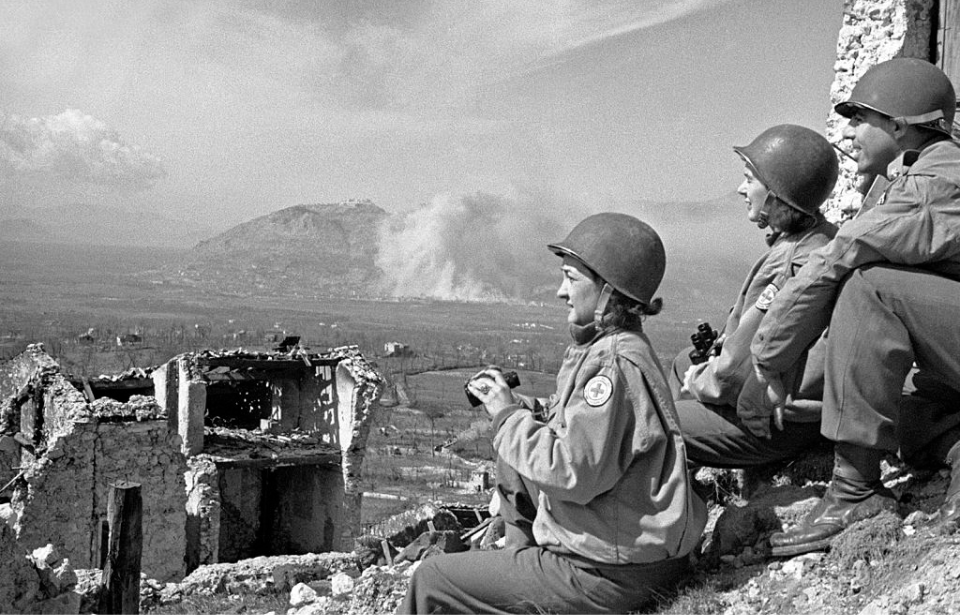 Two nurses and one soldier watching the fighting that occurred during the Battle of Monte Cassino