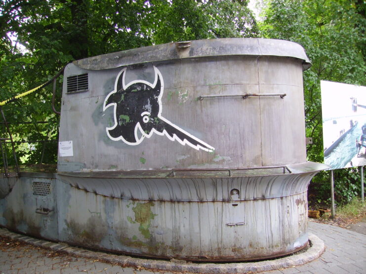 U-boat conning tower with the emblem of a laughing sawfish