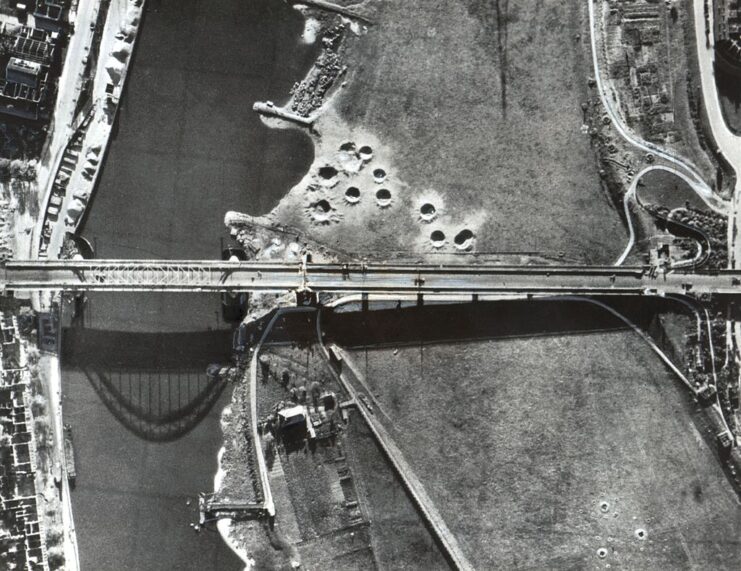 Aerial view of a bridge crossing over a river