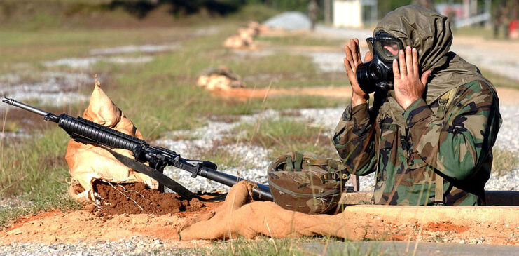 Serviceman with Echo Company preparing to shoot his rifle