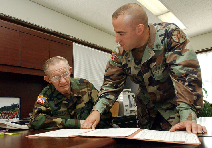 Andrew Rogerson reviewing documents with Charles Robert Jenkins