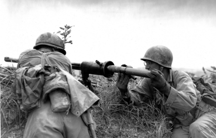 Two American service members manning an M18 recoilless rifle