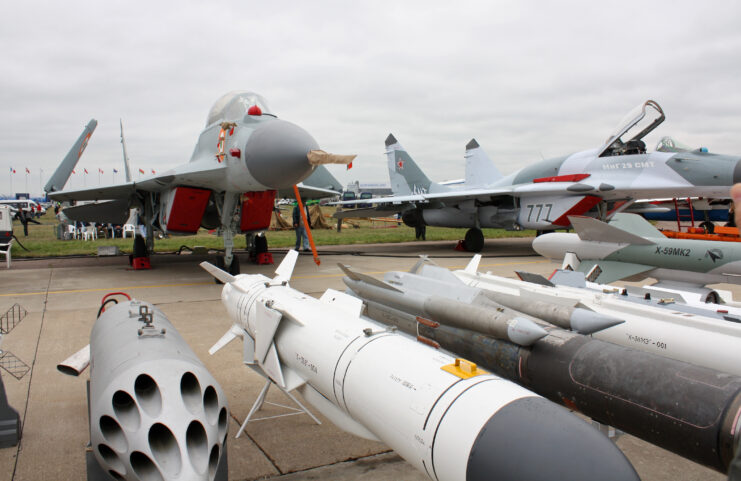 Mikoyan MiG-29K parked behind a line of missiles