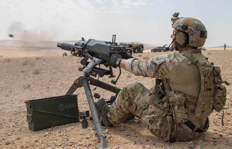 US Army Special Operations Command (USASOC) soldier firing an Mk 47 Striker