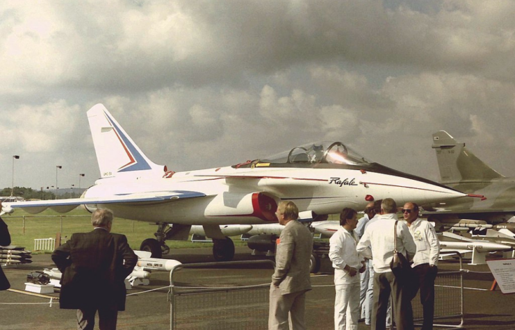 Group of men standing around a Dassault Rafale A