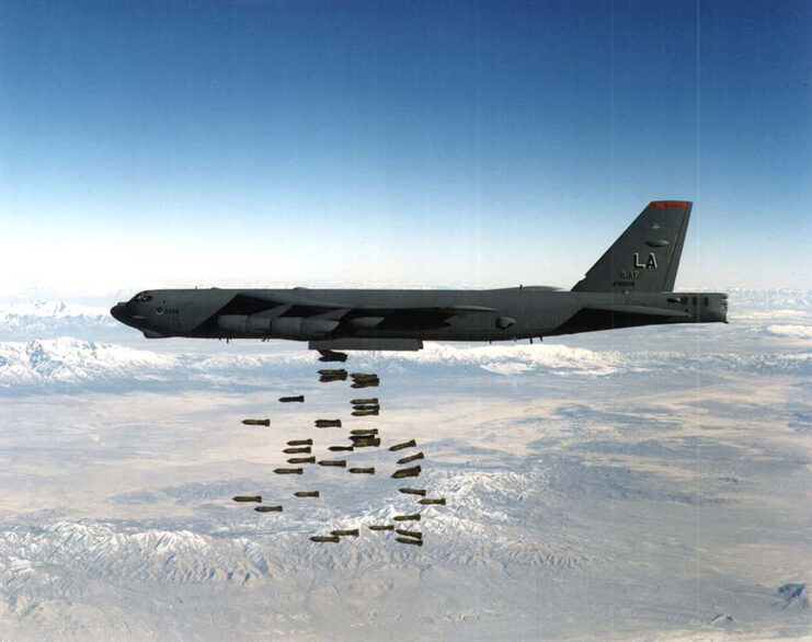 Boeing B-52 Stratofortress dropping bombs mid-flight