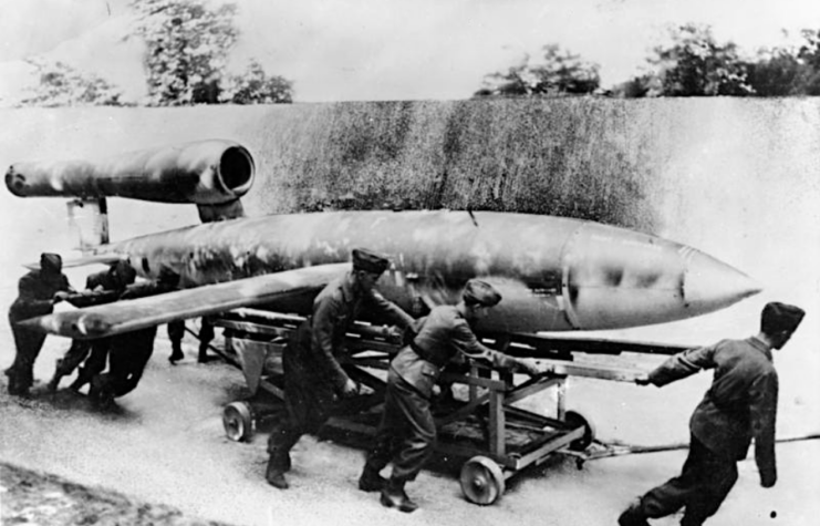Luftwaffe members pulling a V-1 flying bomb