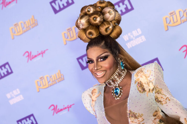 Coco Montrese posing on a red carpet