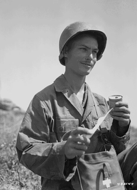 Desmond Doss unraveling medical tape