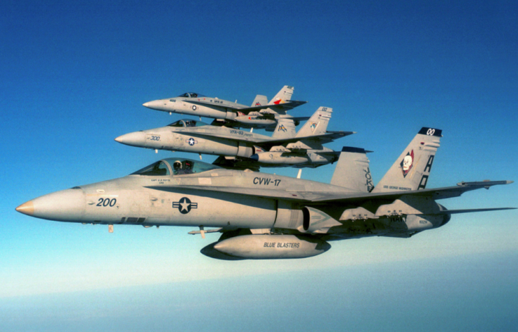 Three McDonnell Douglas F/A-18 Hornets in flight