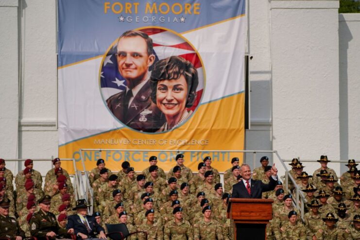 Retired Col. David M. Moore speaking before a large crowd at Fort Moore, Georgia