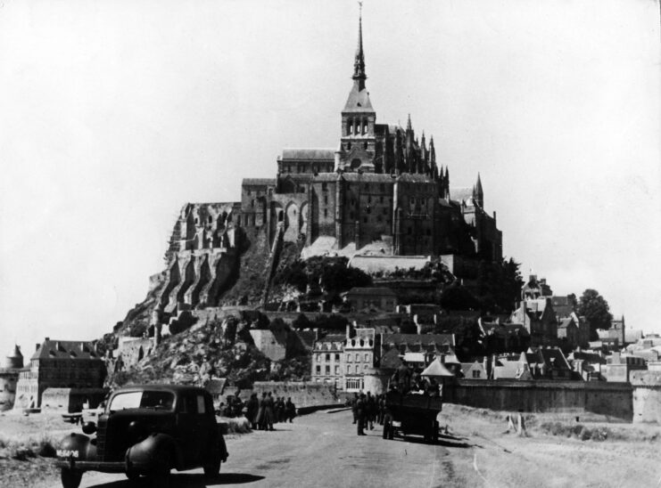 German soldiers and vehicles at the base of Mont-Saint-Michel