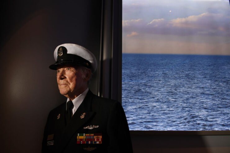 Gunner's Mate 1st Class Hank Kudzik standing in his US Navy uniform