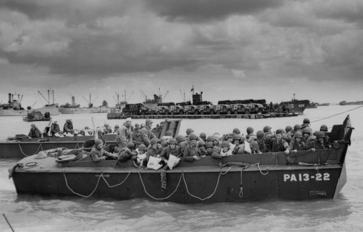 American personnel crowded together within Higgins boats