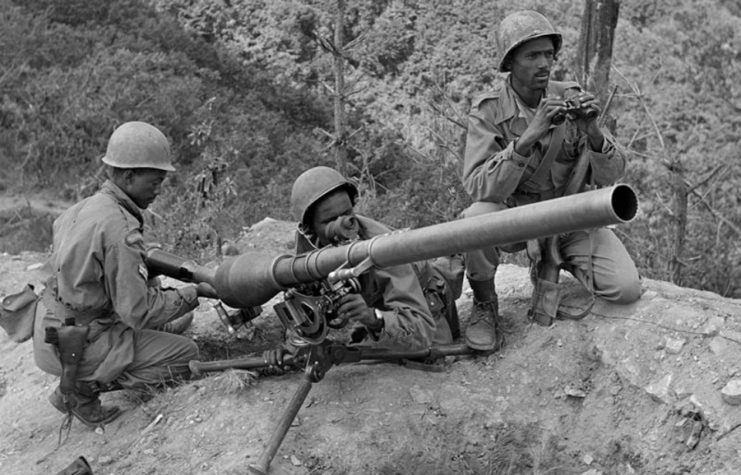 Three Ethiopian soldiers preparing to fire an M20 Recoilless Rifle