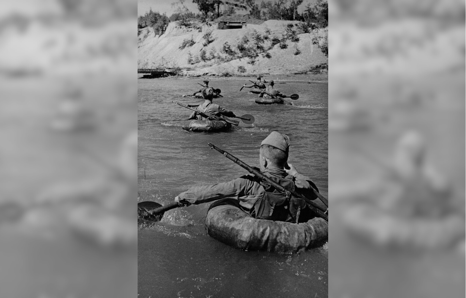 Soviet Red Army sappers wading across a river