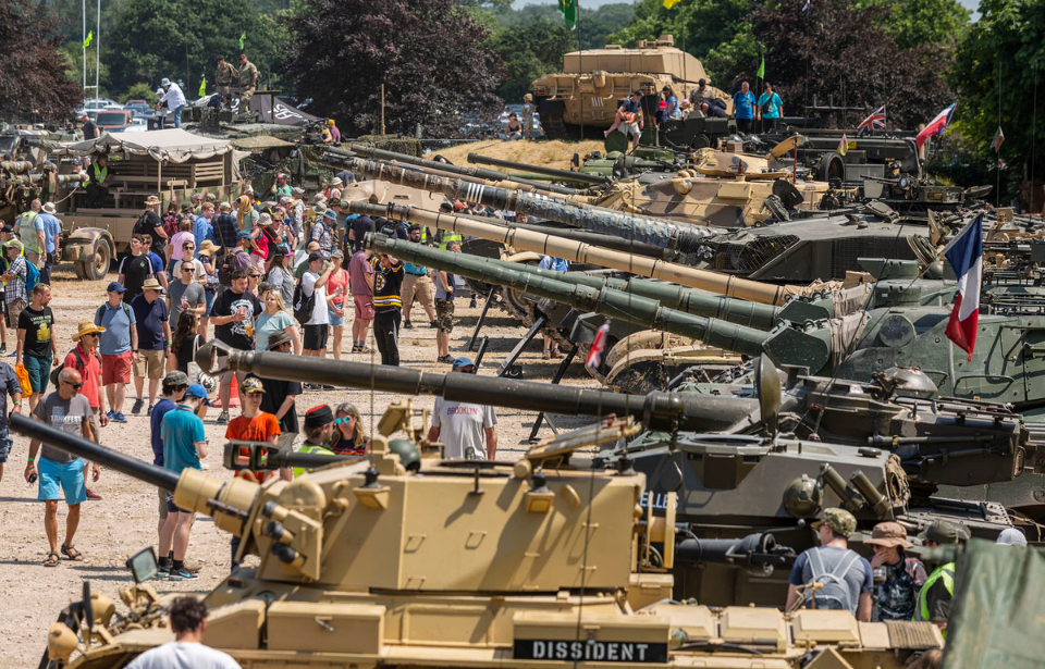 TANKFEST 2023 attendees walking past a row of tanks
