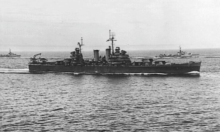USS Philadelphia (CL-41) transiting near two British destroyers