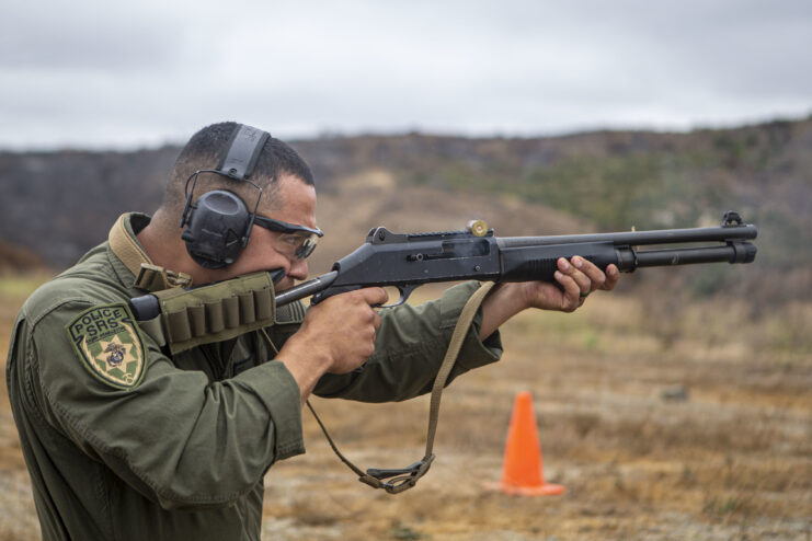 Junior Chavez firing a Benelli M1014 outside