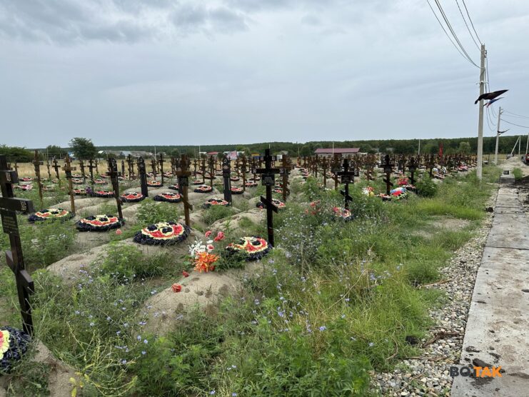 Rows of graves marked by wooden crosses at the Wagner PMC cemetery in Bakinskaya