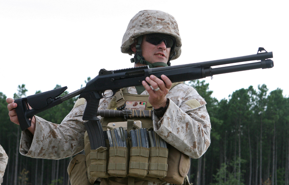 US Marine holding a Benelli M1014