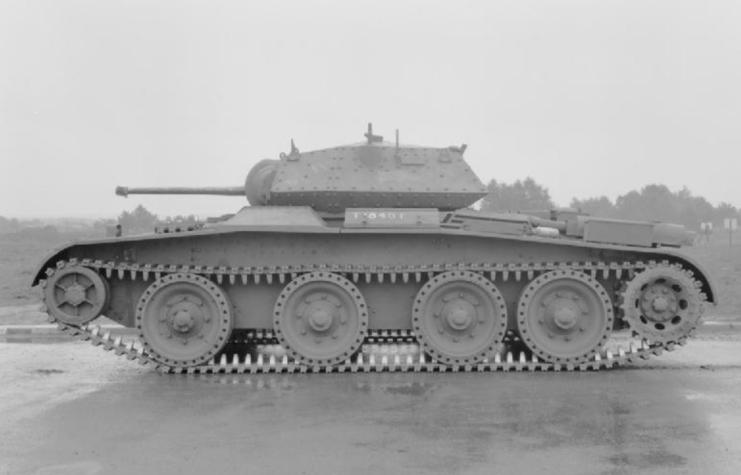 A13 Mk III Covenanter tank parked on rain-covered cement